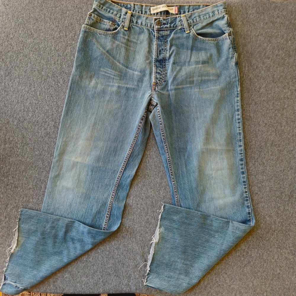 Vintage Levi's 567 Loose Boot Cut Jeans Button Fly Raw Hem Label 36x34 Act 34x31